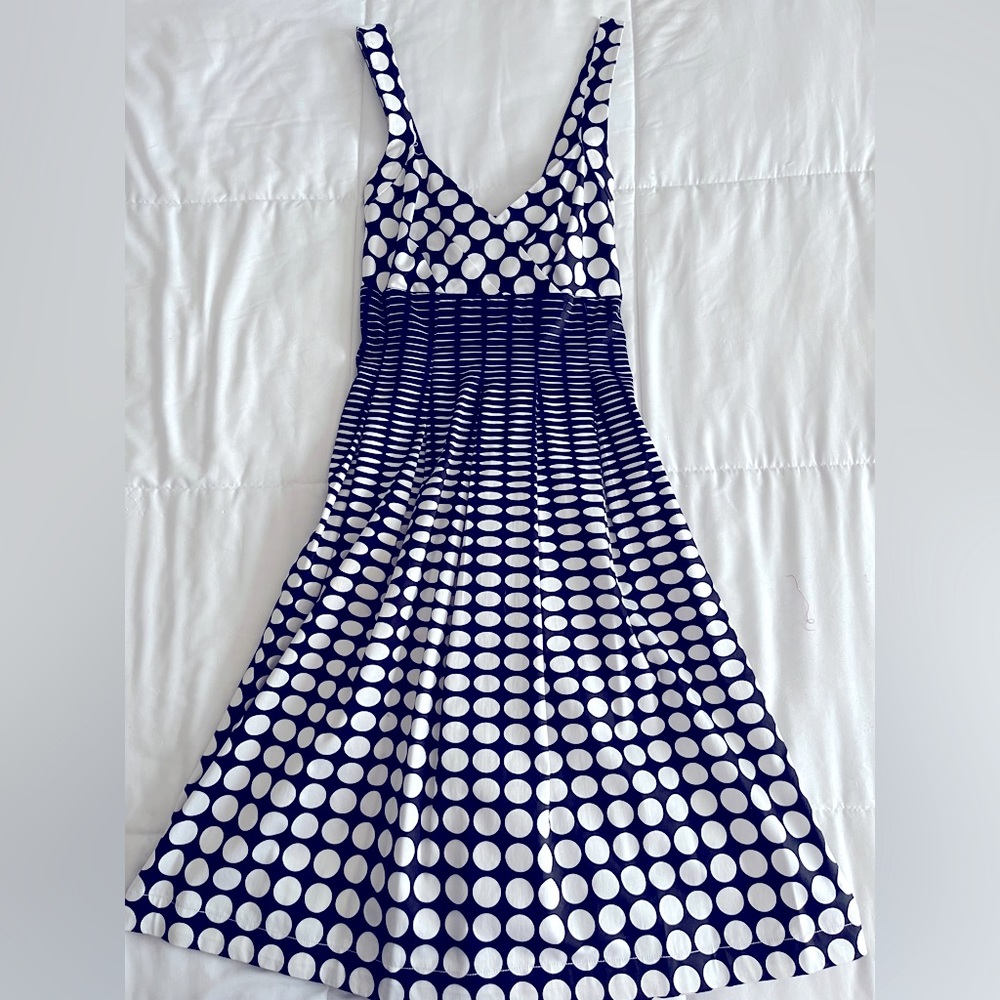 Calvin Klein fit and flare dress. Straps cross in back. Bust is slightly rouched